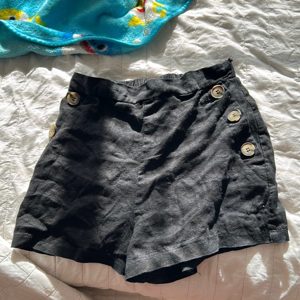 High waisted black linen shorts.